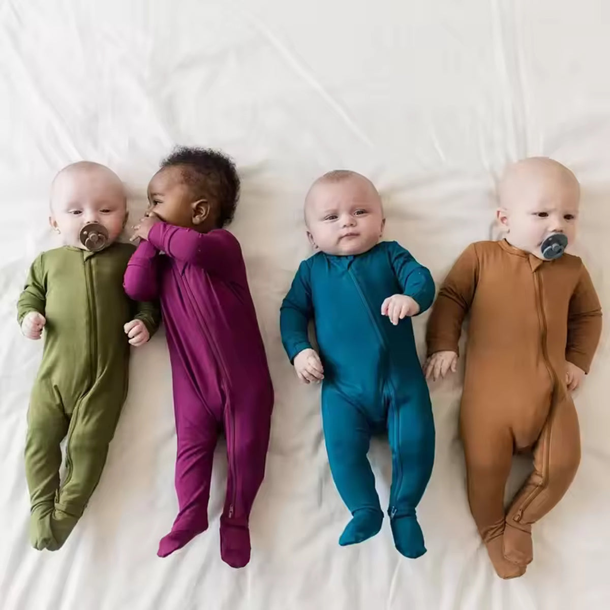 Bamboo Baby Romper worn by real babies in Dark Green, Burgundy, Teal, and Camel