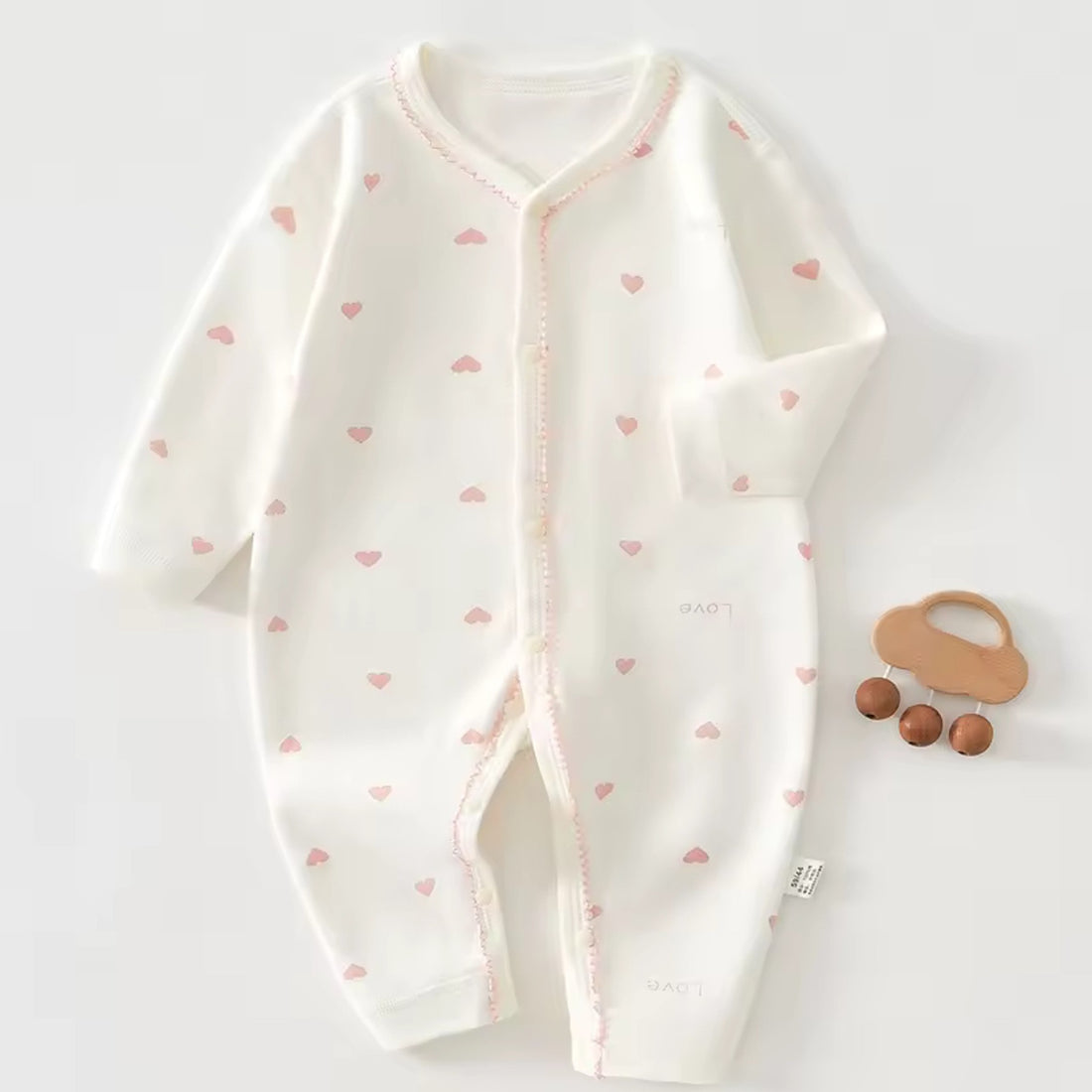 Blush Heart Onesie - front