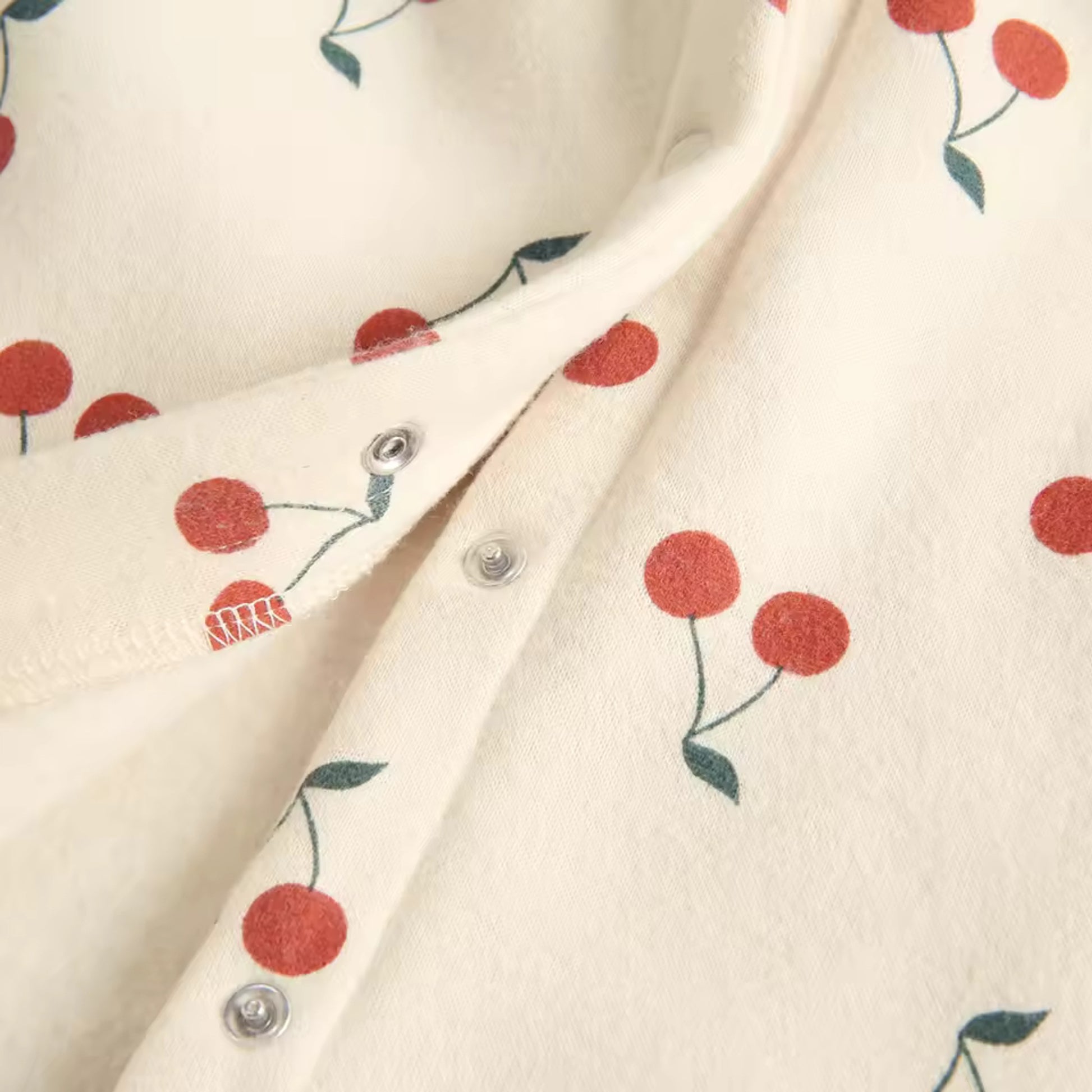 Cherry Hooded Jumpsuit - snap closure detail