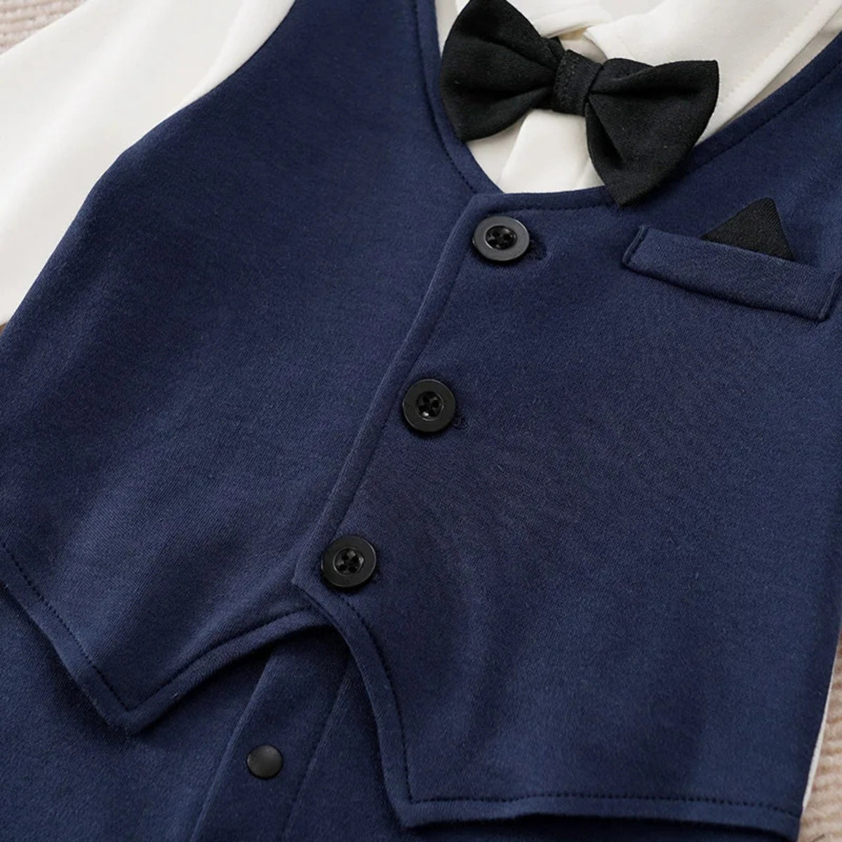 Navy Tuxedo Baby Romper in Classic - baby and toddler clothing, professional product photo