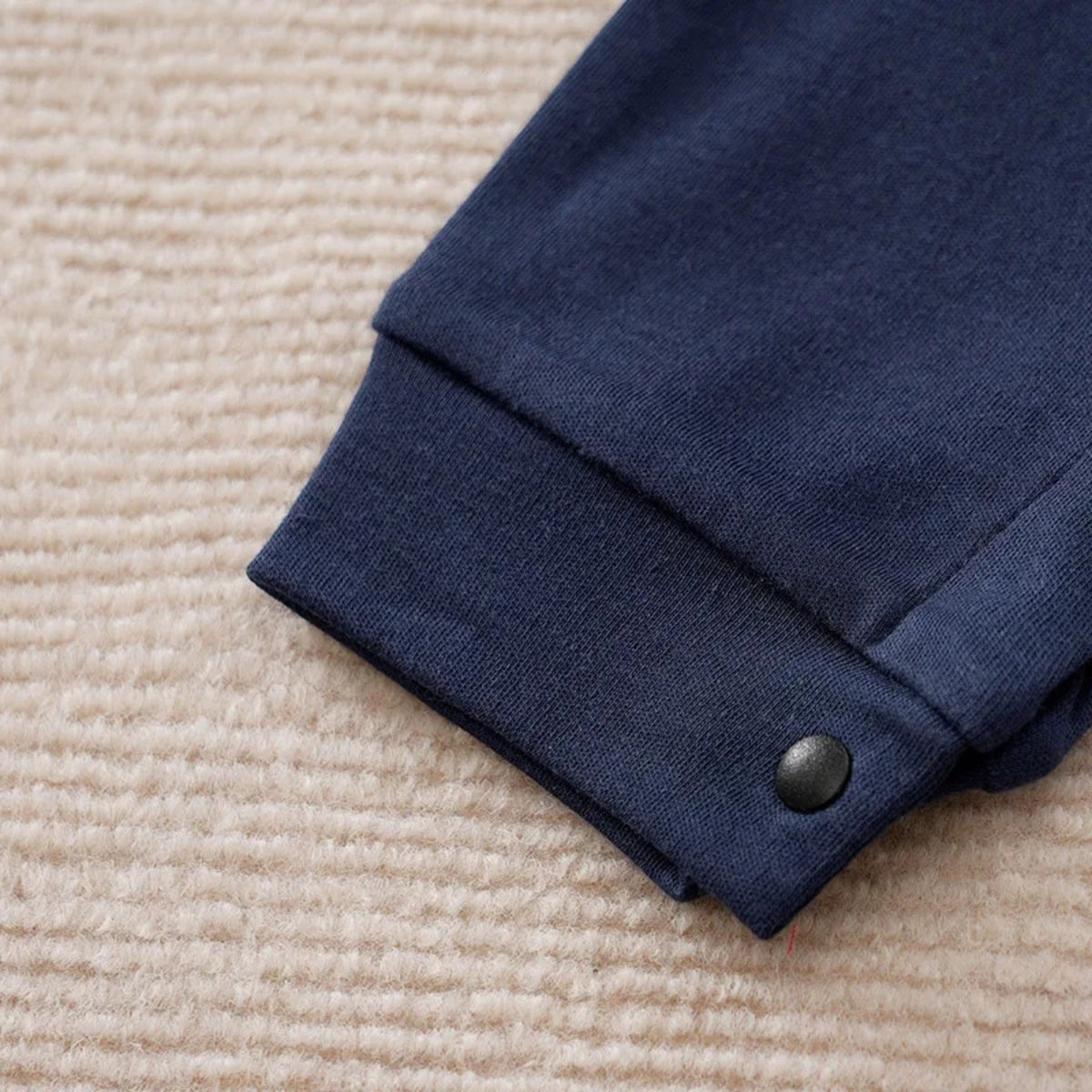 Navy Tuxedo Baby Romper in Classic - baby and toddler clothing, professional product photo