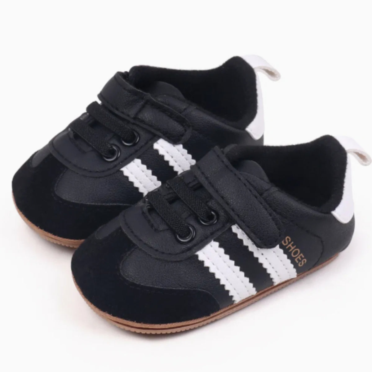 Classic Mini Baby Sneakers in Black - baby and toddler clothing, professional product photo