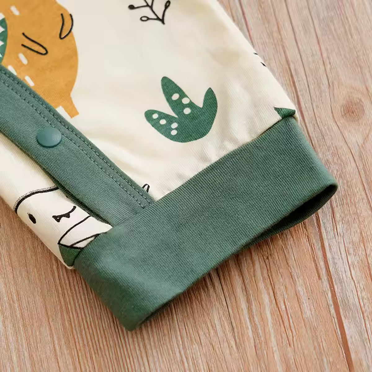 Dino Safari Baby Romper - cuff detail