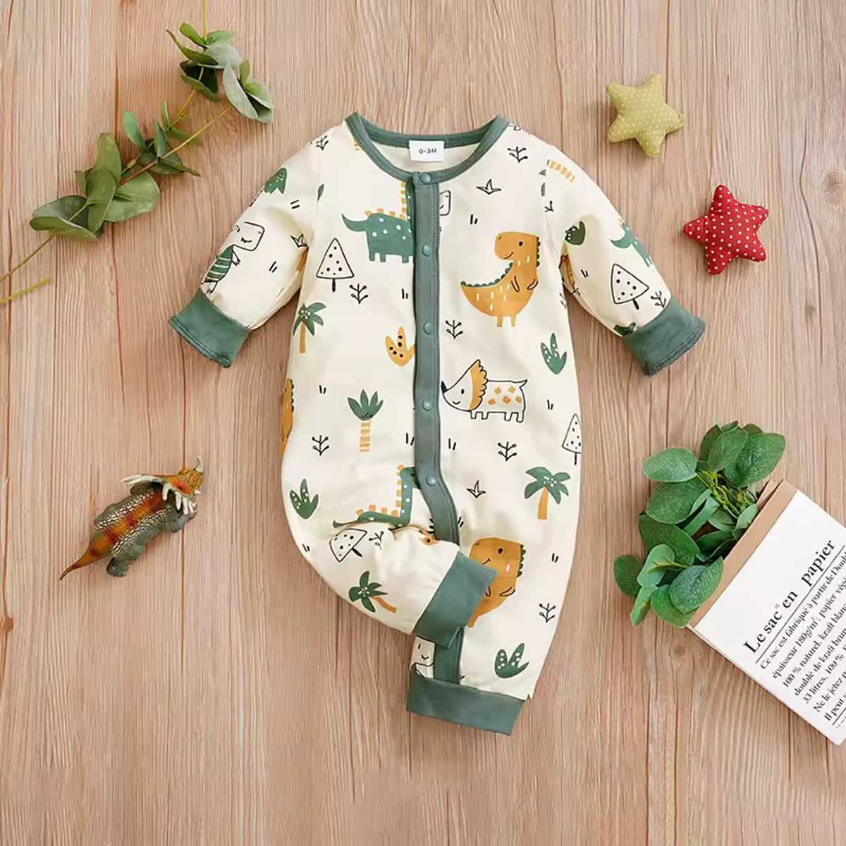 Dino Safari Baby Romper - styled flat lay
