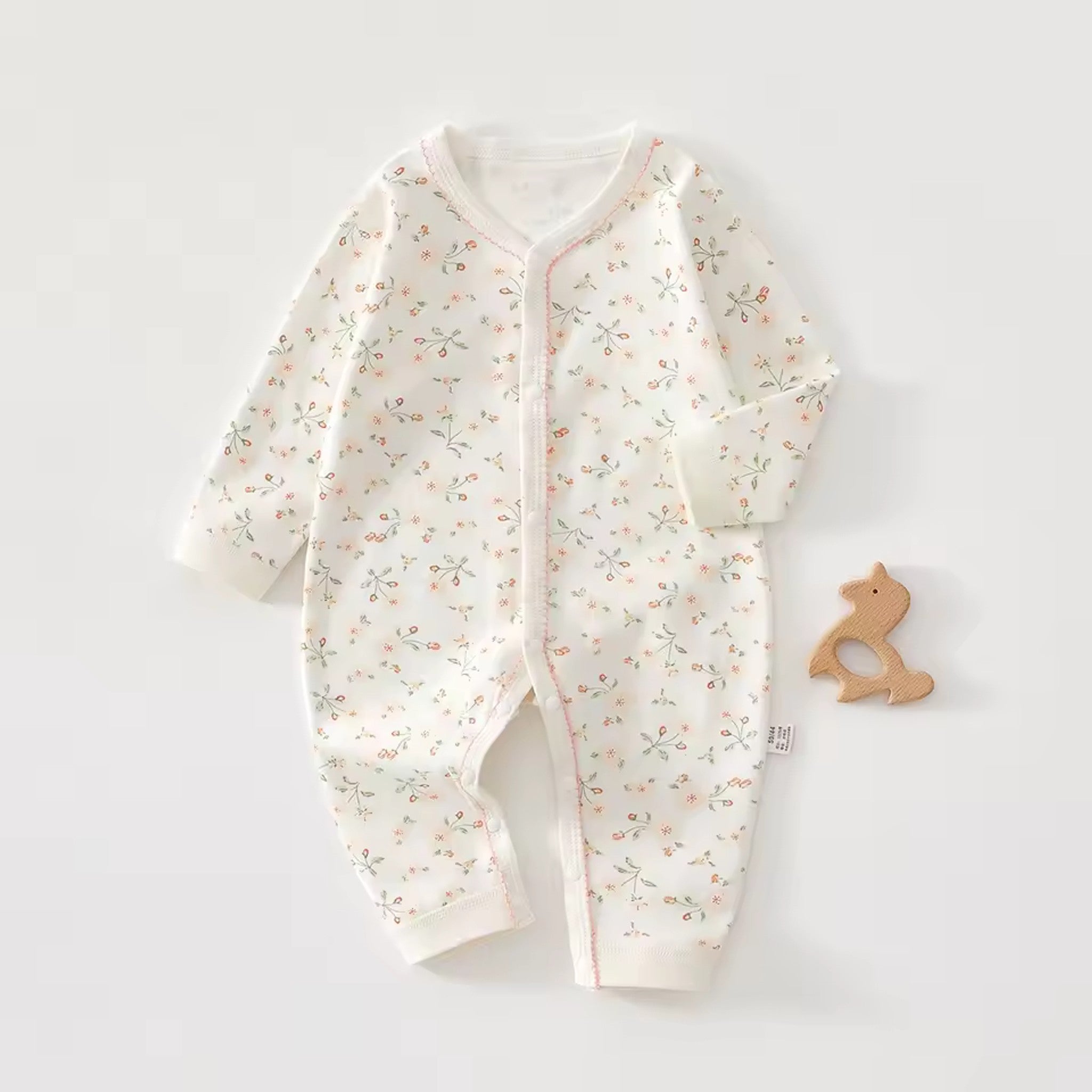 Ivory Floral Onesie - front