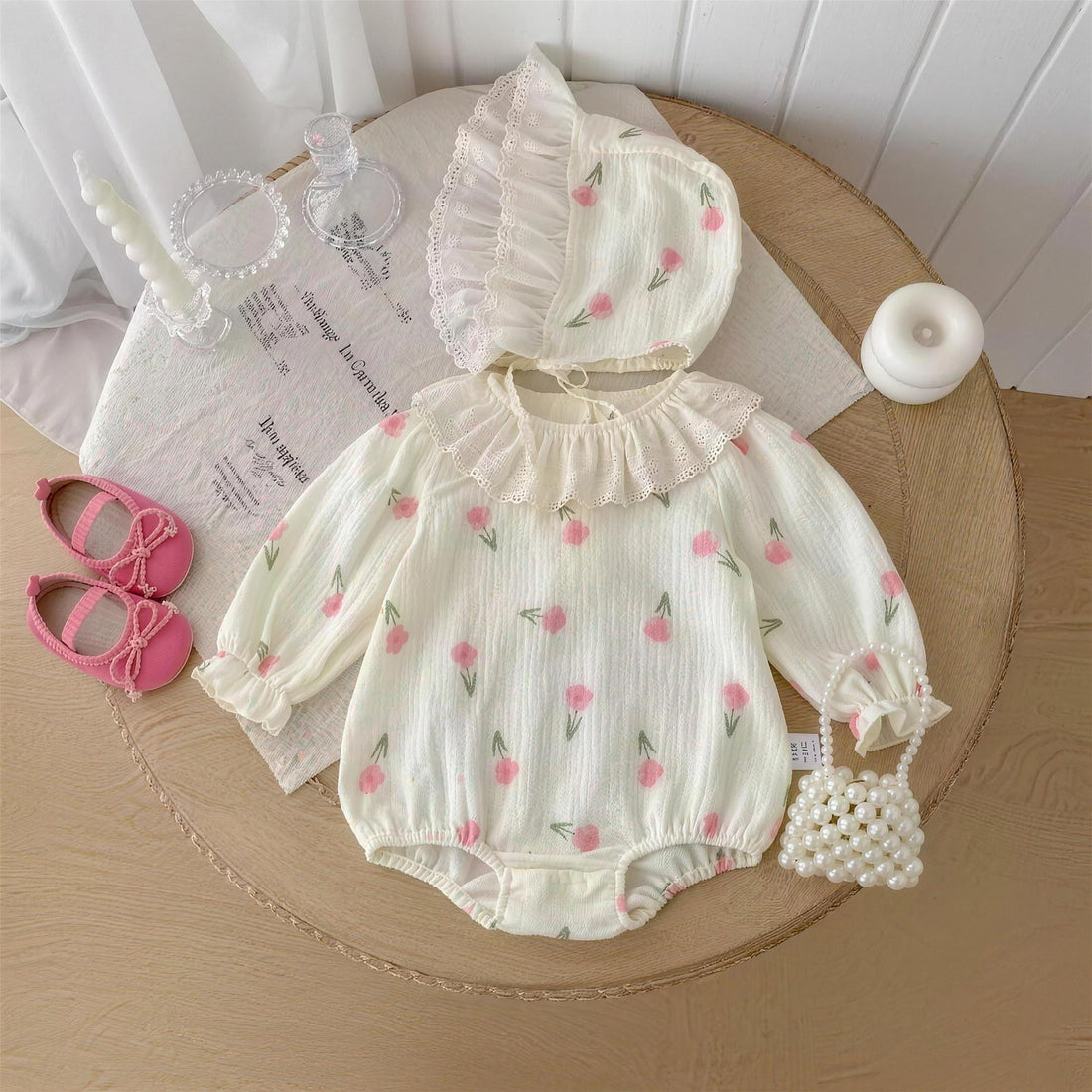 Tulip Print Bonnet Romper - professional product photo on white background