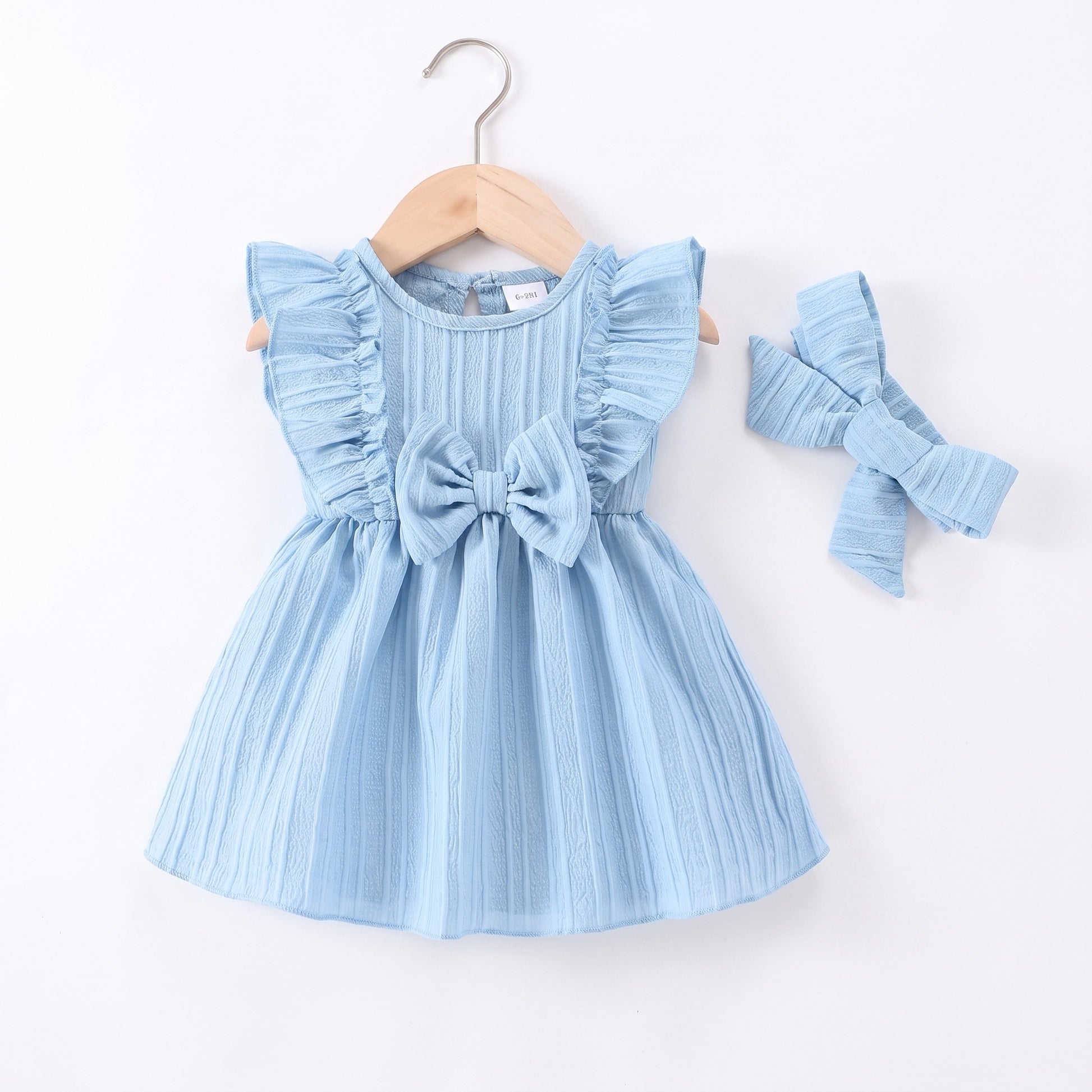 Ruffle Bow Knit Dress in Blue with matching headband, professional product photo on white background